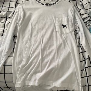 white t shirt with red writing on the back